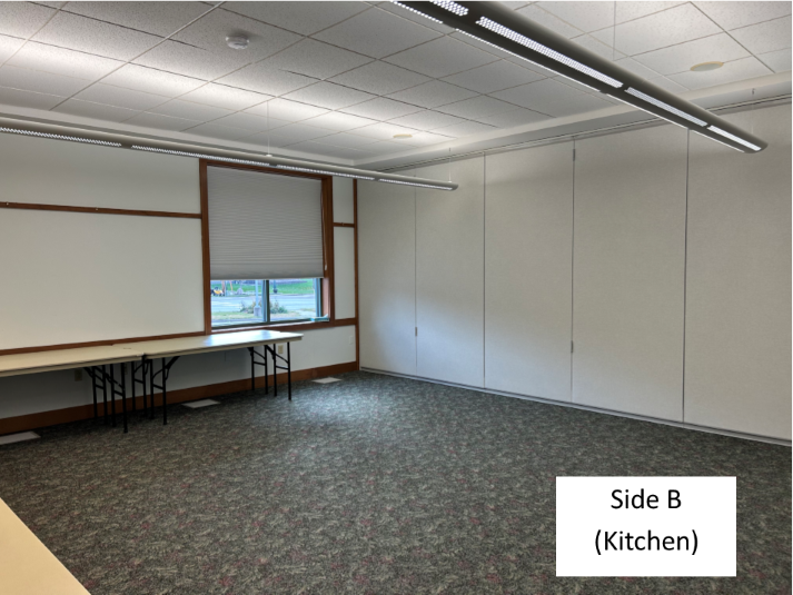 Photo of Community Meeting room Side B (kitchen) shown with divider wall